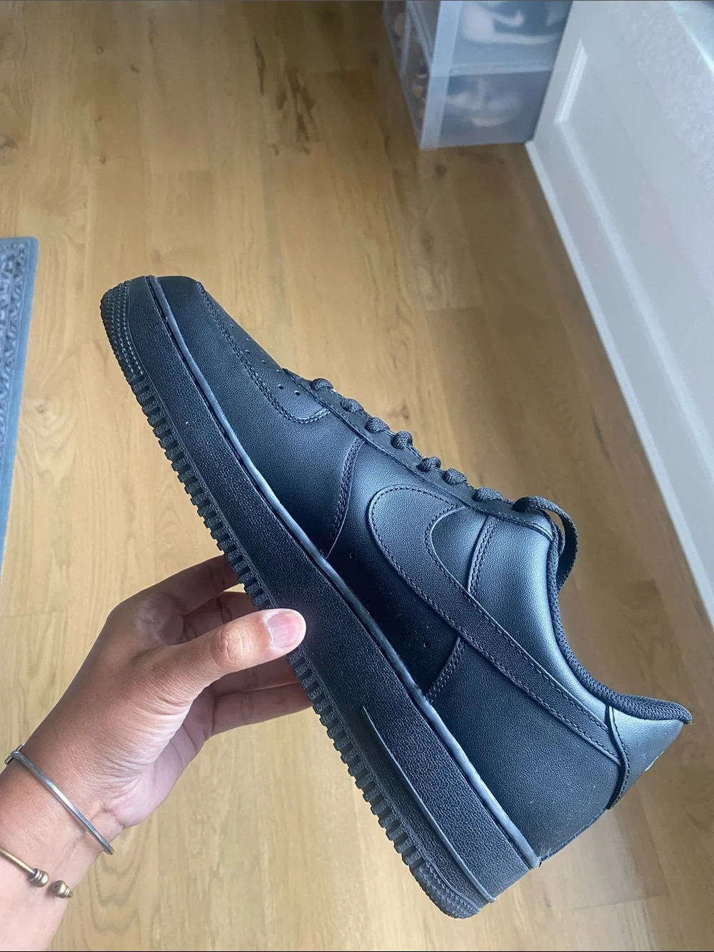 Nike Air Force’s Black Men’s Low-Top Leather Sneakers